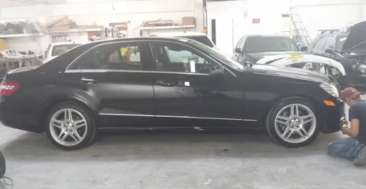 Mercedes-Benz E-Class in for body and paint work at Lombard Auto Body in San Francisco